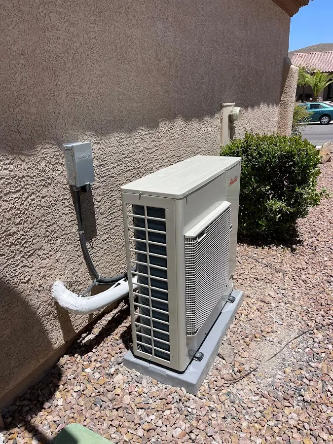 Residential air conditioning condenser unit in Middlebury